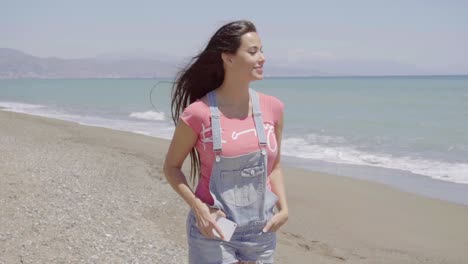 Side-view-on-woman-looking-at-beach