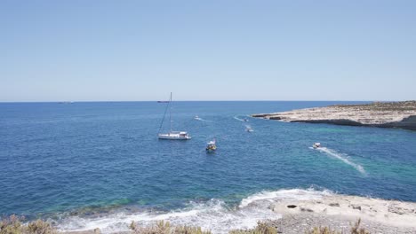 boats are sailing on the water of mediterranean sea in malta