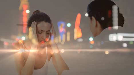 animation of night road traffic over caucasian woman having headache