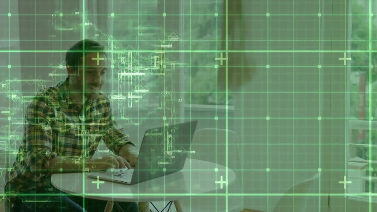 Mid adult man powering laptop and typing while monitoring live data with translucent green overlay