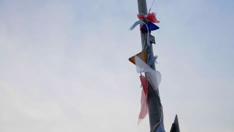 close-up shot of bunting wrapped around a lamppost