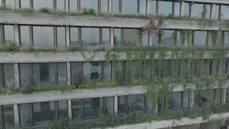 Aerial-Drone-Shot-Krakow-Poland-Abandoned-Soviet-Brutalist-Structure-Hala-Forum-at-Sunrise