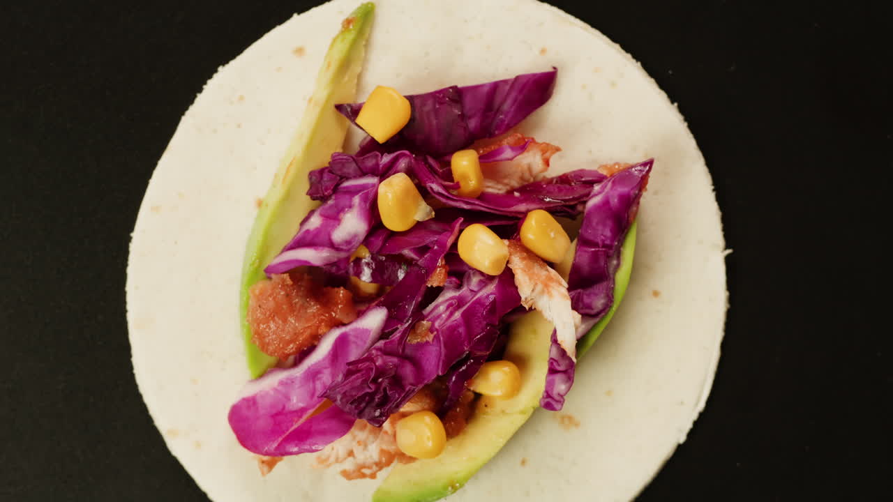 Chicken Taco with Avocado, Corn, and Cabbage