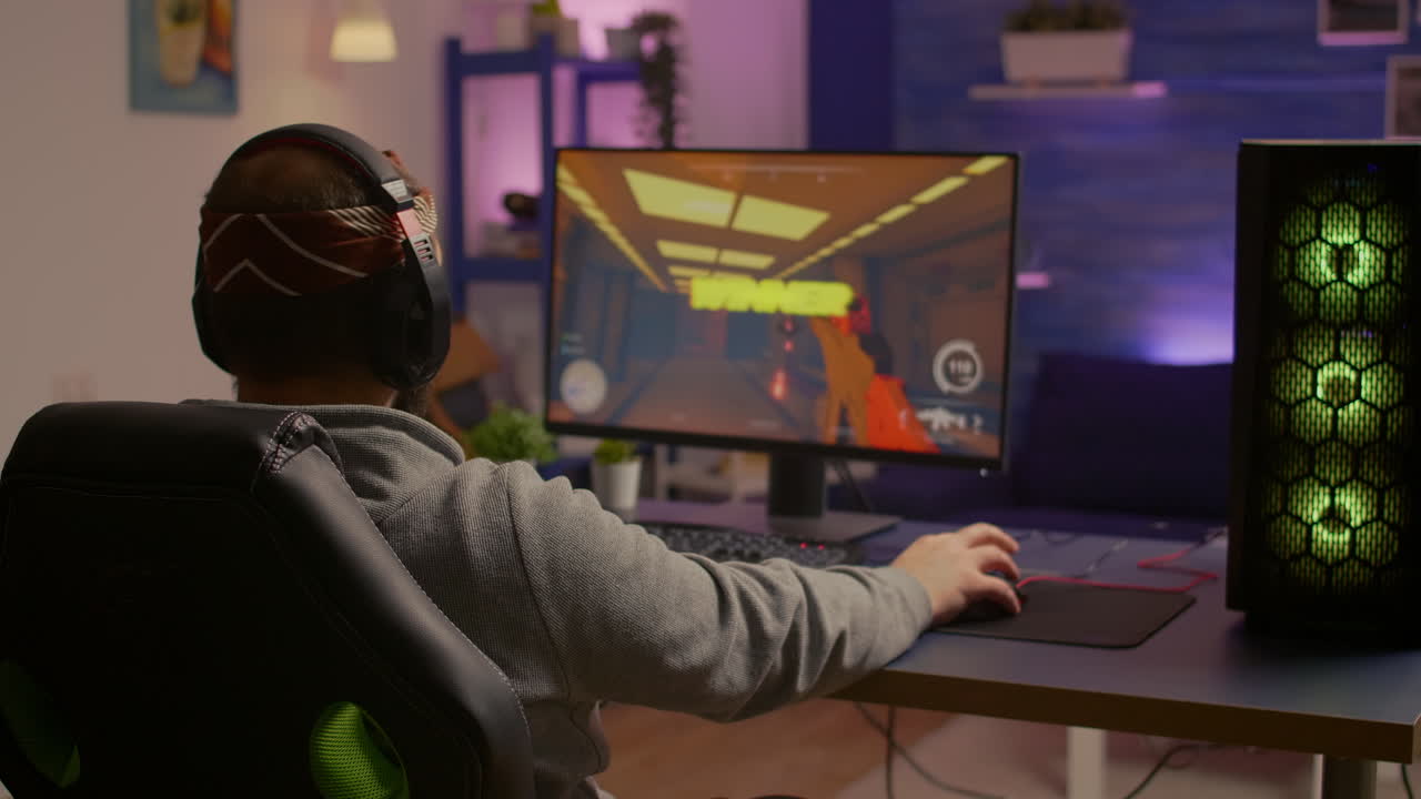 Videogamer playing graphics cyber space sitting on gaming chair