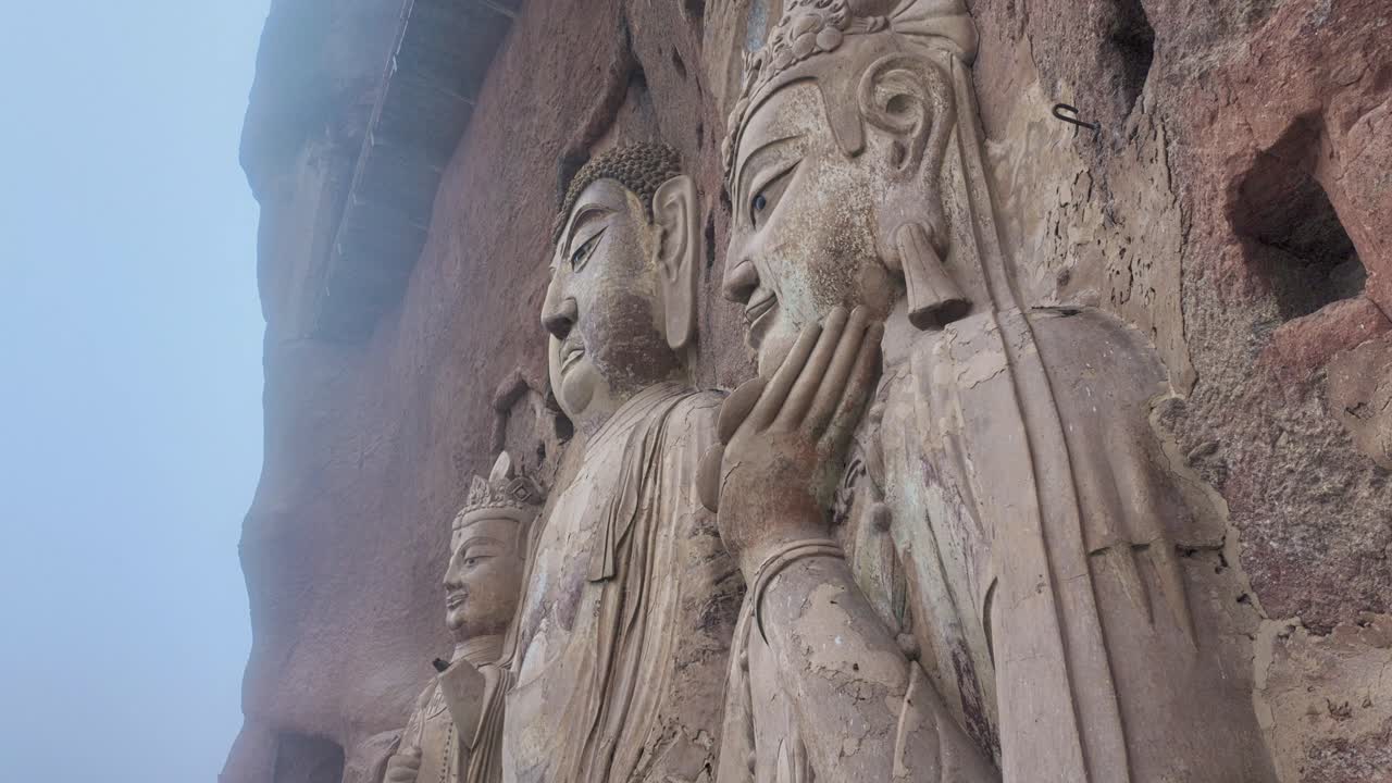 Buddhist Sculptures Carved Into Cliff Face Of Maijishan Grottoes In Tianshui, Gansu Province, Northwest China. Close-up Shot