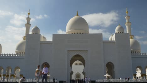 sunny day abu dhabi famous grand mosque front entrance flowers panorama 4k united arab emirates