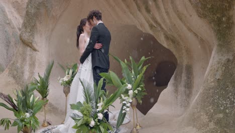 romantic wedding couple in a cave