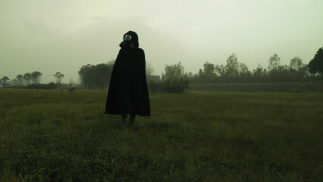 nuclear disaster survivor walks in field with harmful radiation