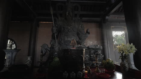 altar with statue of warrior in bai dinh temple vietnam