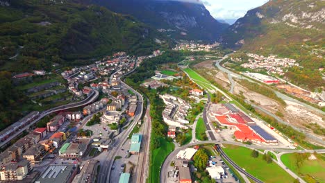 captivating drone view over longarone, nestled in italy’s stunning dolomites.
