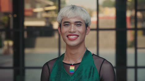 portrait of a smiling transgender man
