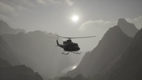 helicopter flying over mountains