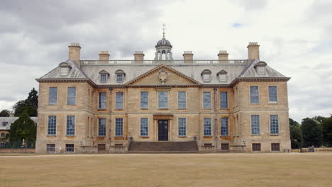 Establishing-shot-of-a-huge-mansion-on-a-wealthy-stately-home-manor-house-estate-in-England