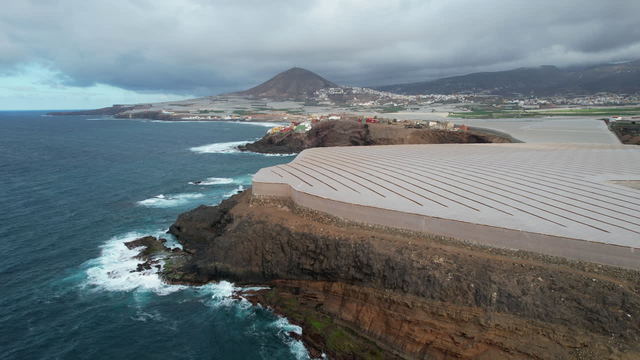 Aerial view of banana plantations covering the cliffs of gran canaria, near Galdar town, canary islands, spain