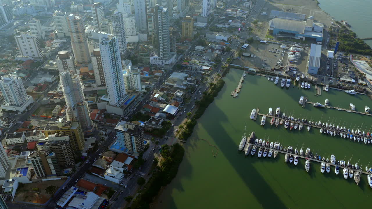 Amazing aerial fly over the Itajaí city with marina full of local boats and yachts, Santa Catarina, Brazil