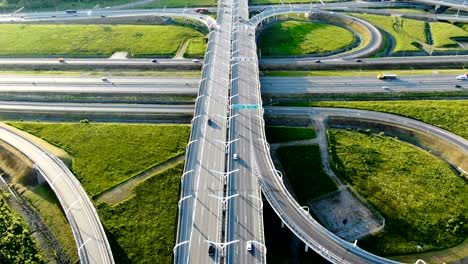 turning circle with driving lane lit by morning sunlight