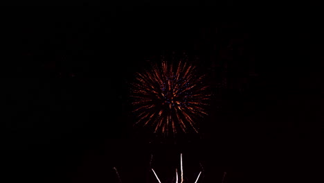 colorful firework display at night on sky background