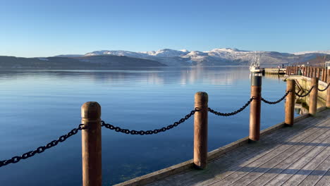 View-from-right-to-left-over-Fauske-pier,-Skjerstad-fjord,-saltdal,-Northern-Scandinavia,-Bright-sunny-day