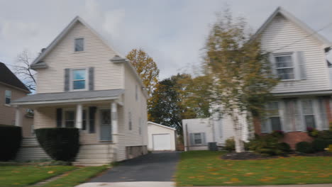 Drive-along-a-typical-American-street-where-the-houses-are-decorated-for-Halloween