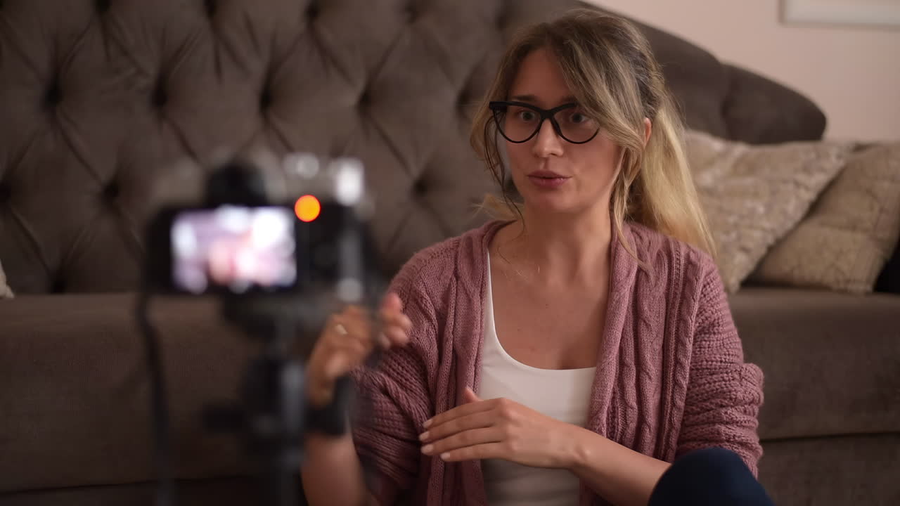 Woman vlogging indoors