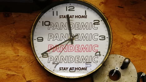 animation of a clock with words pandemic and stay at home during coronavirus covid 19 pandemic