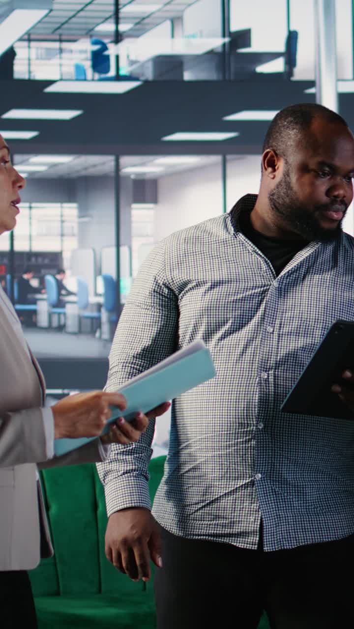 Vertical Video Empowered diverse leaders discussing financial strategy and planning