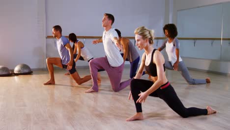 Group-of-people-performing-stretching-exercise