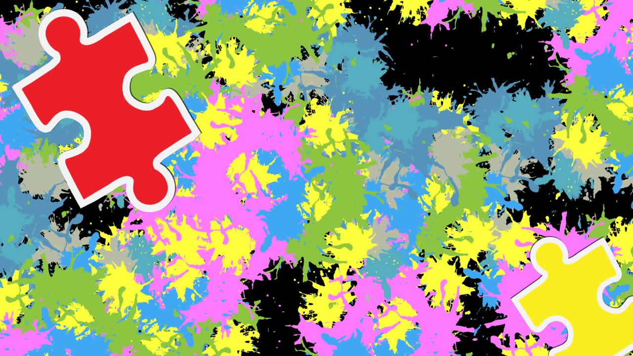 animación del rompecabezas que cae sobre manchas coloridas