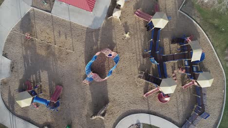 straight down aerial of playground with no children due to covid virus