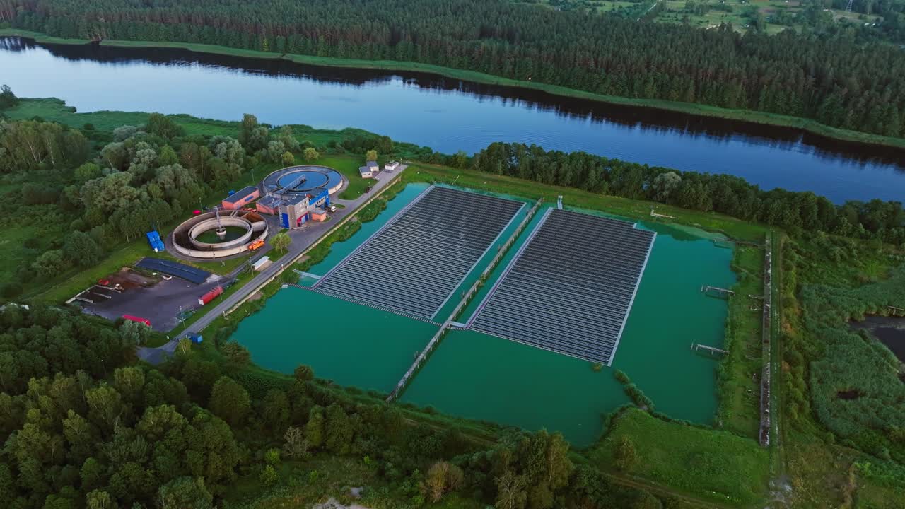 Eco facility with dual circular tanks - floating solar fields, Lielupe River