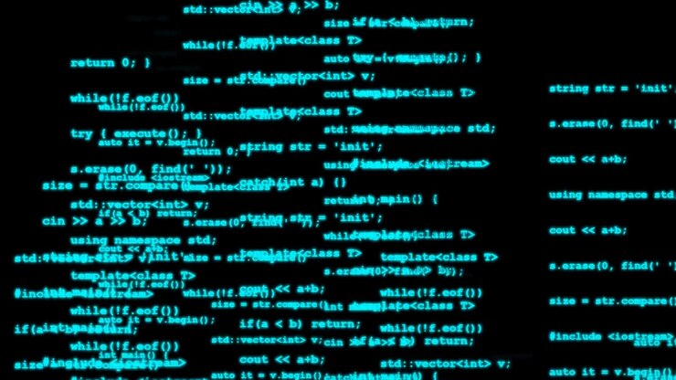 Rullende C++ programmeringskode på mørk baggrund
