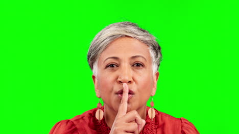 Secret,-green-screen-and-senior-woman-in-a-studio