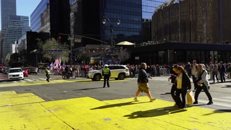 a sea of trump’s supporters fills the streets around madison square garden, their excitement shining brightly in the warm daylight