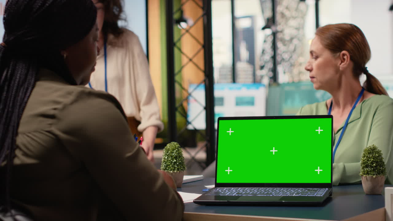 Multiethnic group of professionals using copy space in a modern office setting