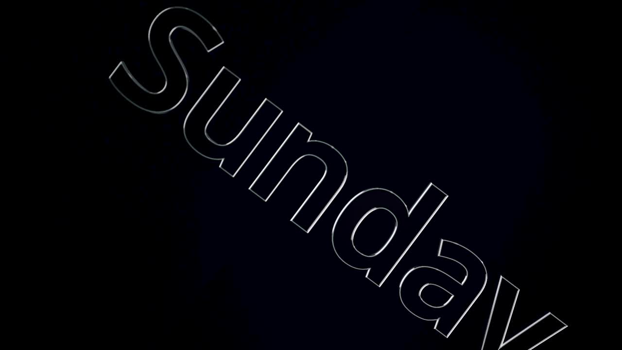 primer plano de la palabra "domingo" en un fondo oscuro