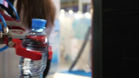 industrial robot handling a water bottle