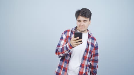 dancing man with phone in hand.