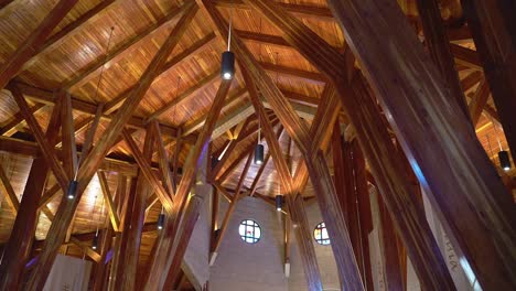 wooden church rafters in modern wedding venue building interior