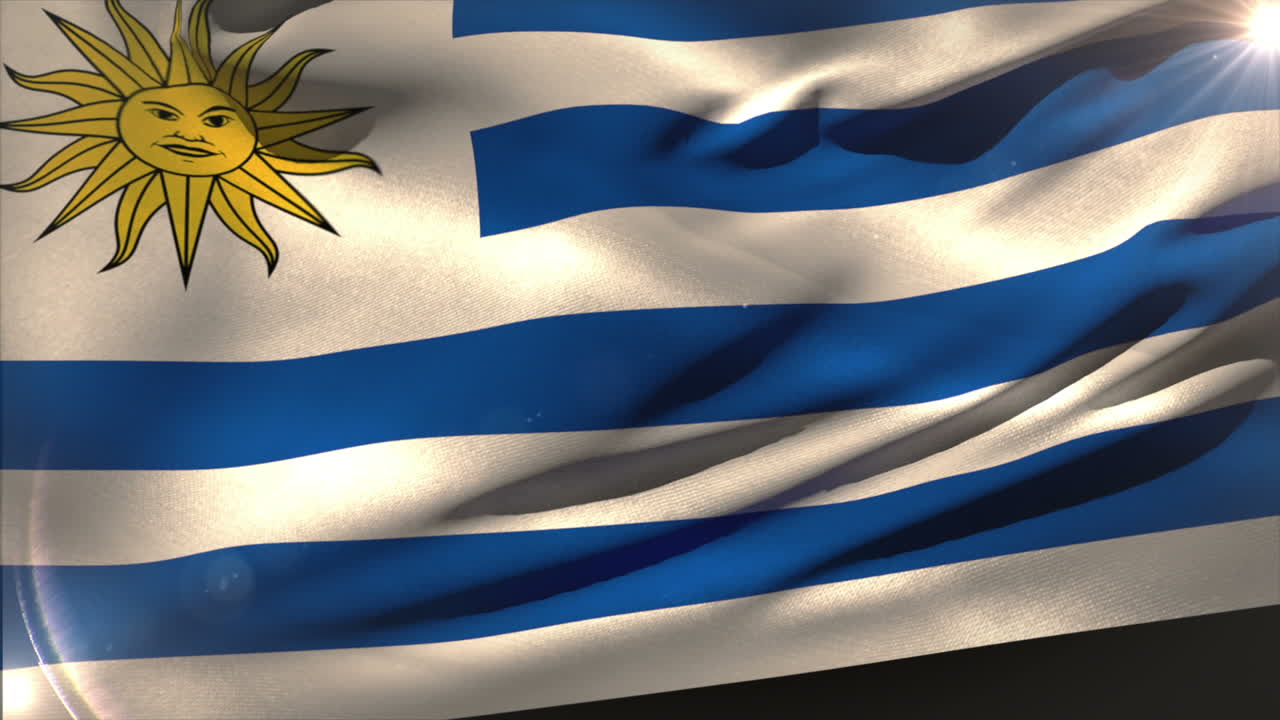 una gran bandera nacional uruguaya ondeando