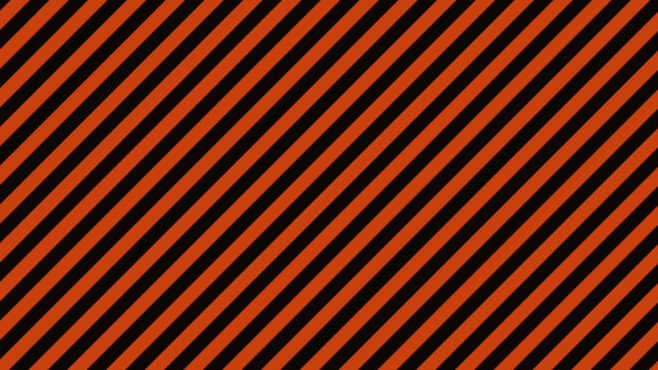 fondo con rayas diagonales negras y naranjas (bucle sin costuras)