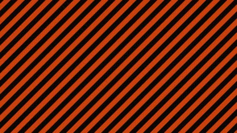 black and orange diagonal stripe background (seamless loop)