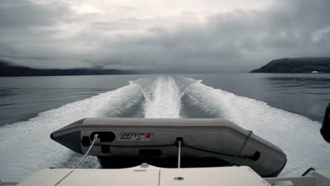 Sailing-trails-in-icy-water,-outside-Nuuk-Greenland