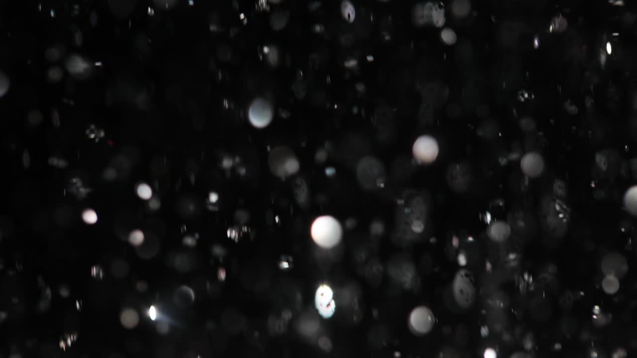 Abstract Falling Rain Bokeh Background