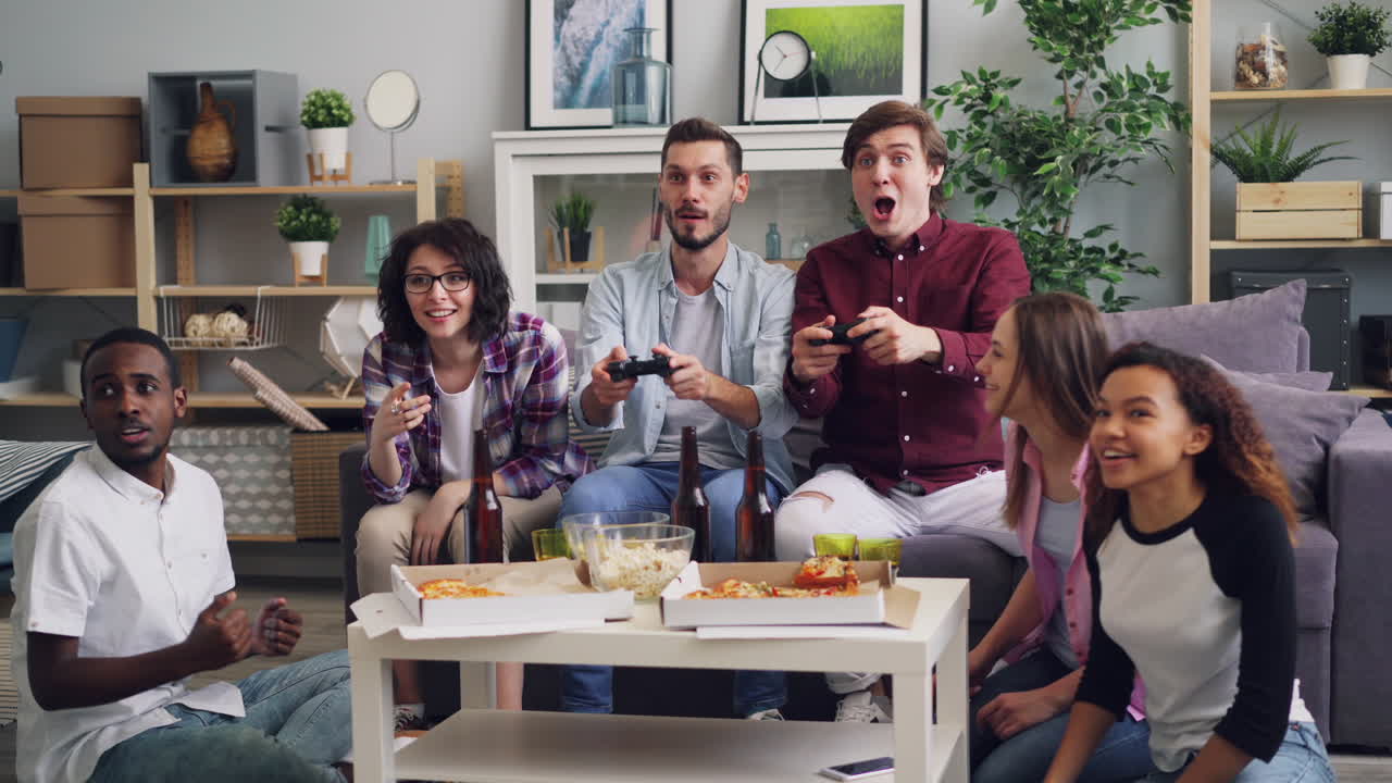 Friends Having Fun Gaming at Home