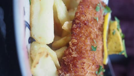 close-up of crispy golden fried fish and chips