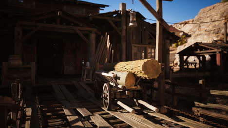 a wooden cart loaded with logs in front of an old western town