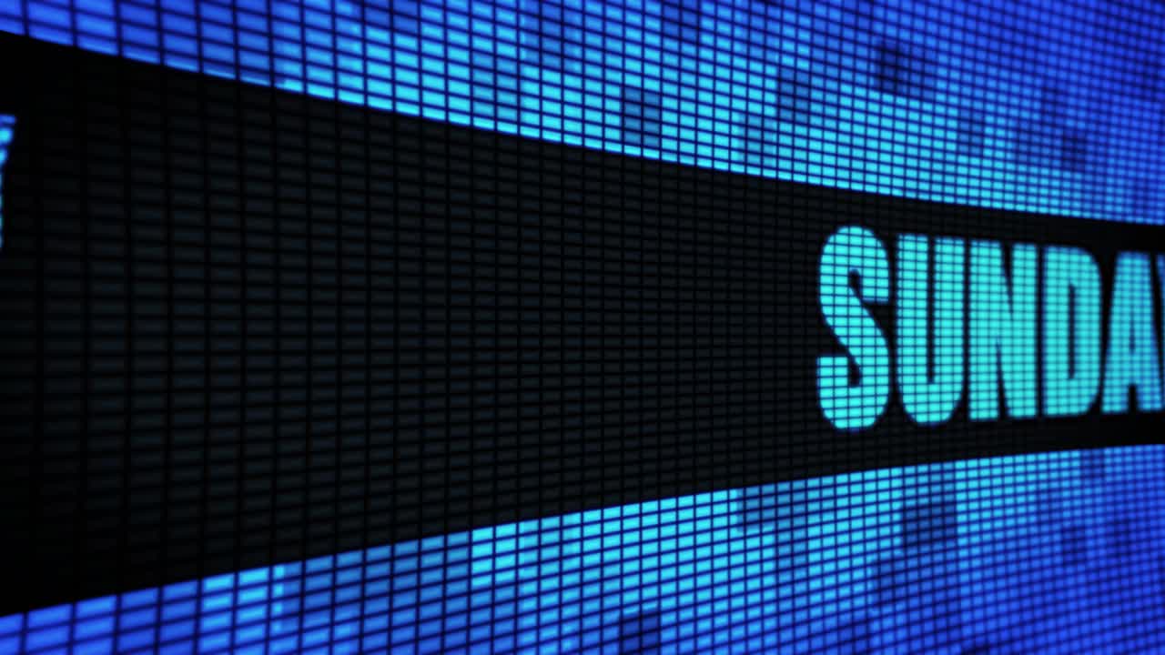 Sunday displayed on a digital LED screen