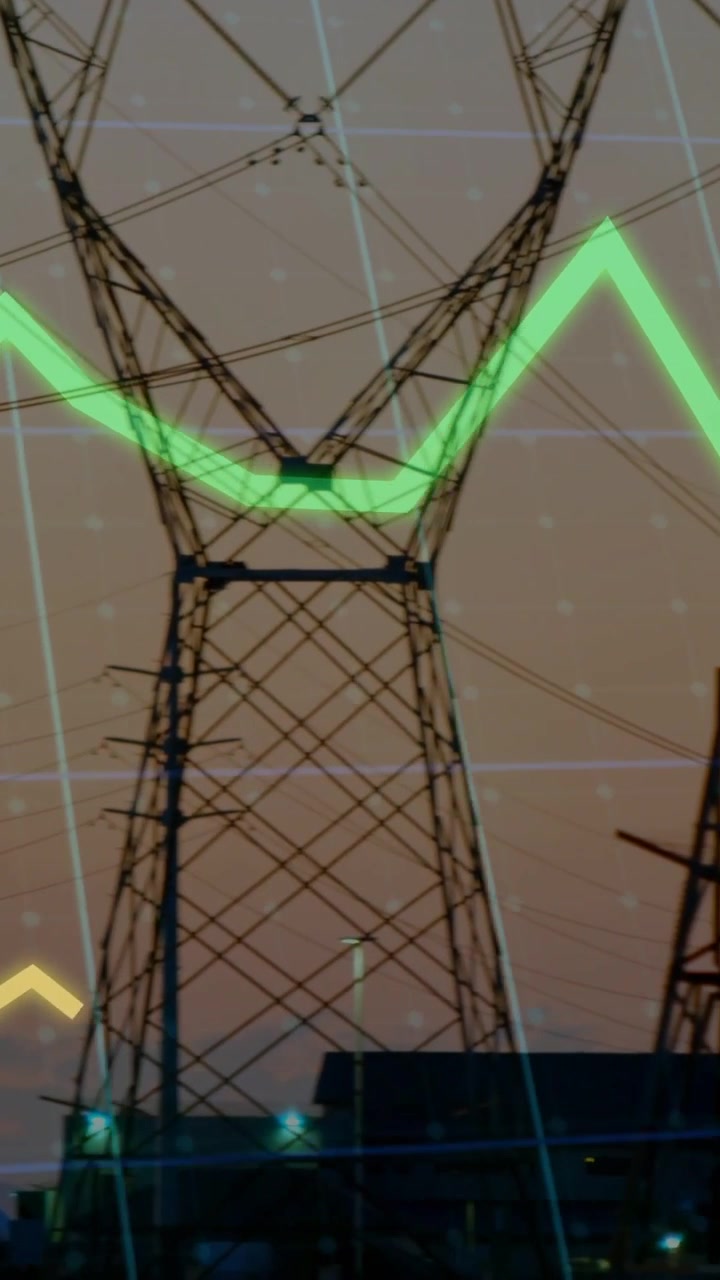 Vertical video: Poles and towers framing dusk while camera panning, green chart mapping power grid