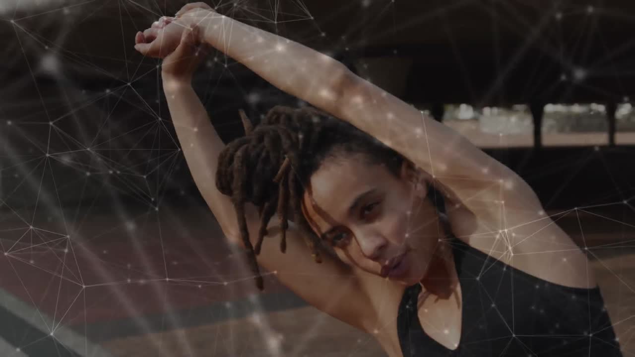 Network of connections against african american fit woman performing stretching exercise