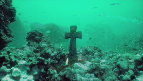 underwater cross in coral reef